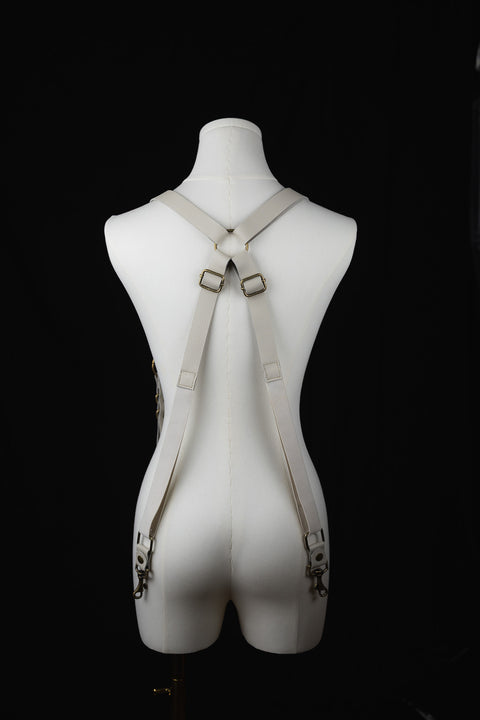 Artisan-made leather suspenders crafted in Ecuador with brass accents