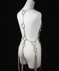 handmade leather harness featuring brass o-ring fringe tassel design