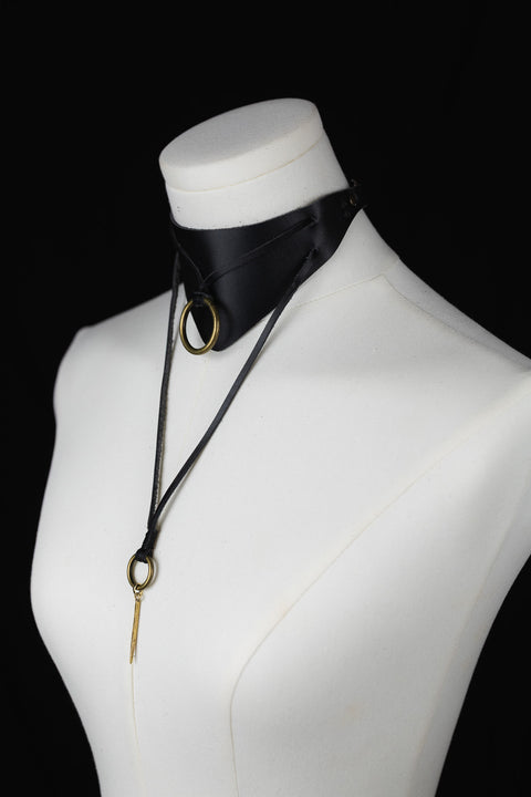 black artisanal leather collar designed for customizable styling