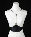 Black leather corset for layering over dresses or tops