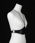 Black leather waist corset with central brass ring detail