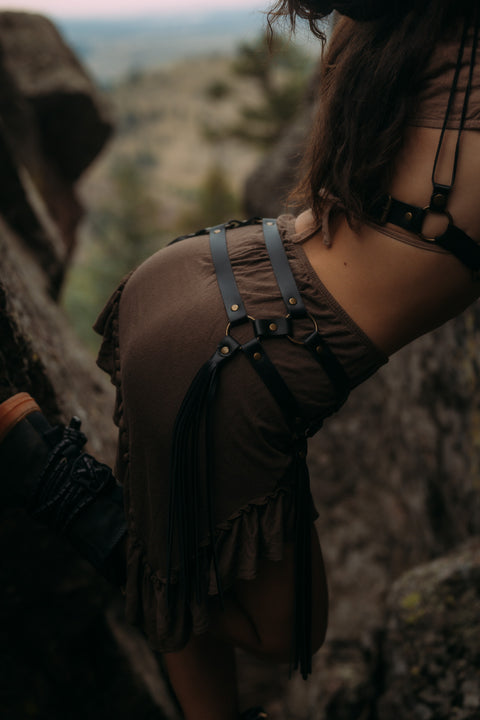 black Hip-accentuating leather fringe belt with brass ring accents