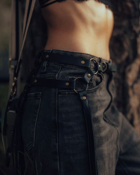 close up of Ethically sourced leather fringe belt with swaying tassels