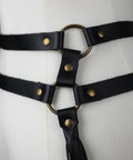 close up of brass loops on Leather fringe belt that moves with your body for performance