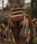 Movement-enhancing leather fringe belt for performance or dance