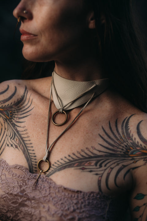 Leather choker necklace with brass O-ring accents
