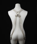 Artisan-made leather suspenders crafted in Ecuador with brass accents
